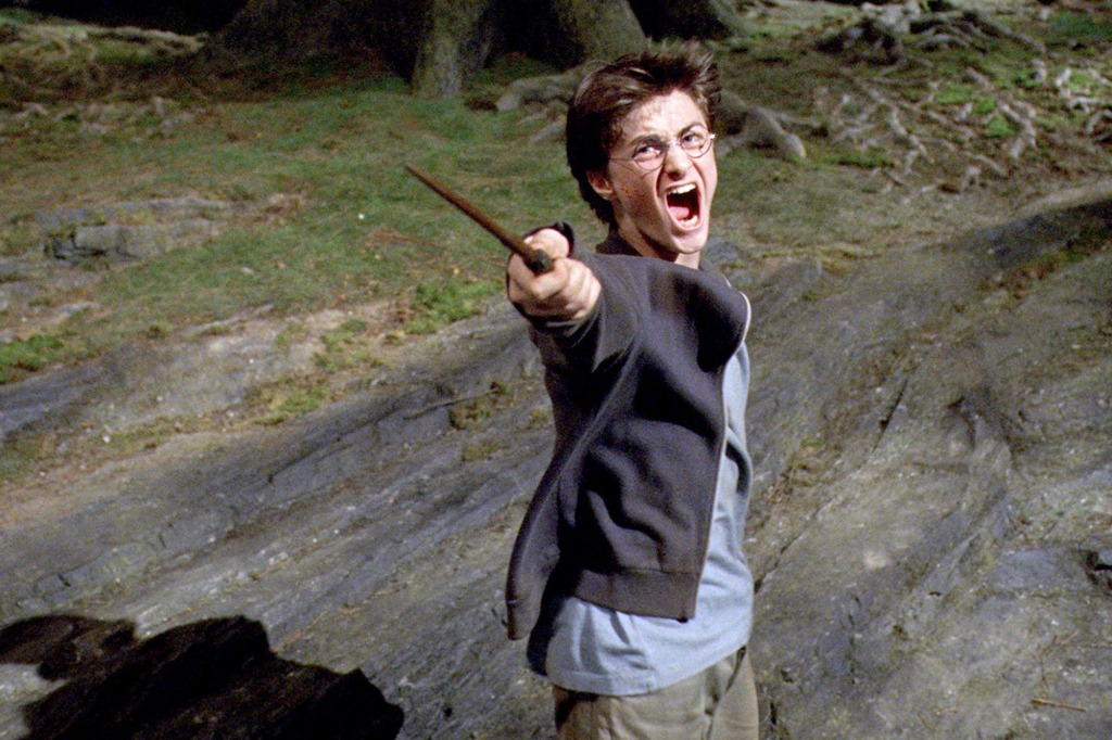 Harry Potter screams as he casts a spell.